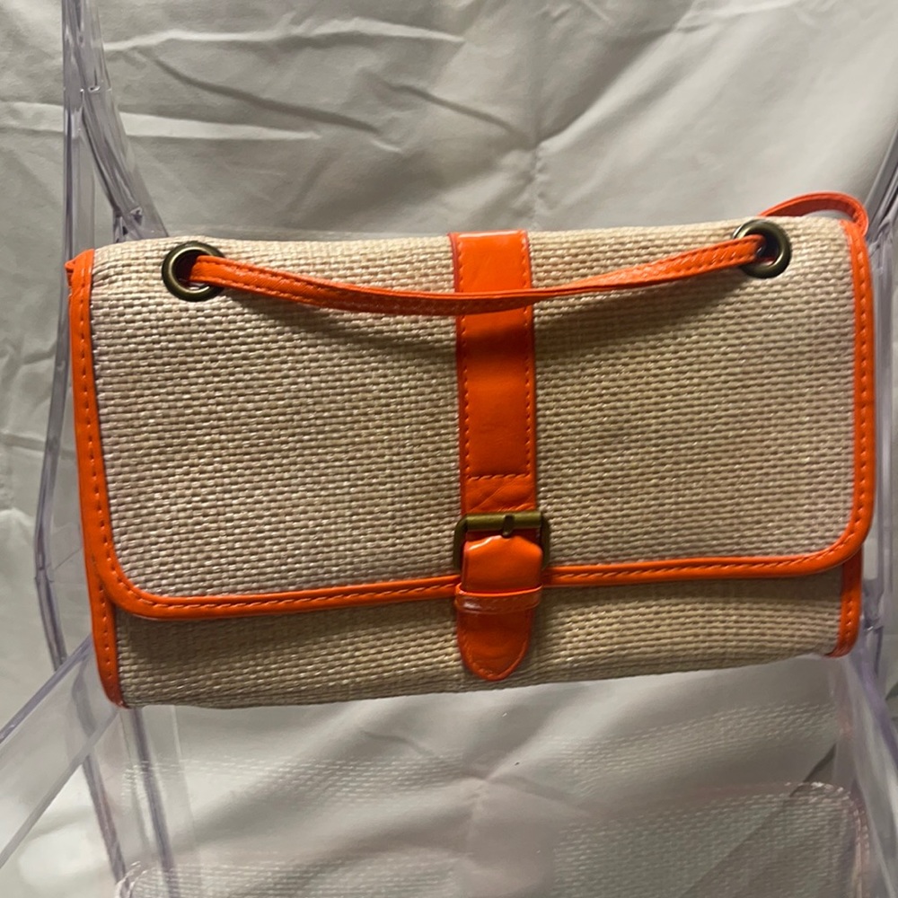 Straw clutch with orange patent accent
